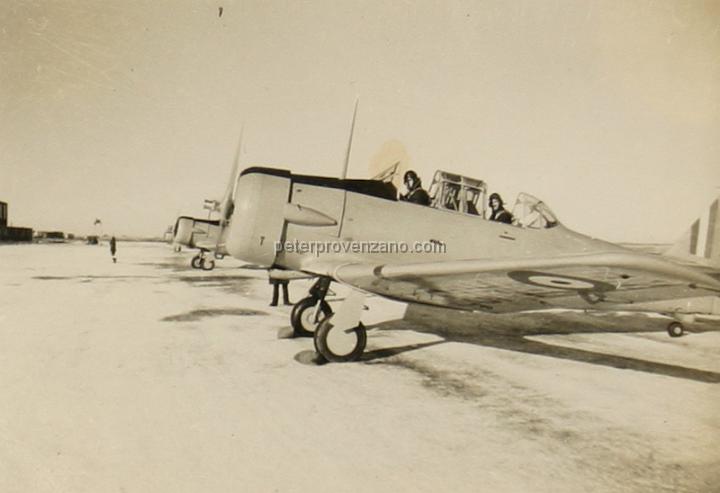 Peter Provenzano Photo Album Image_copy_157.jpg - Royal Canadian Air Force (RCAF), North American Harvard IIB (AT-6A) on the tarmac running up, 1942.